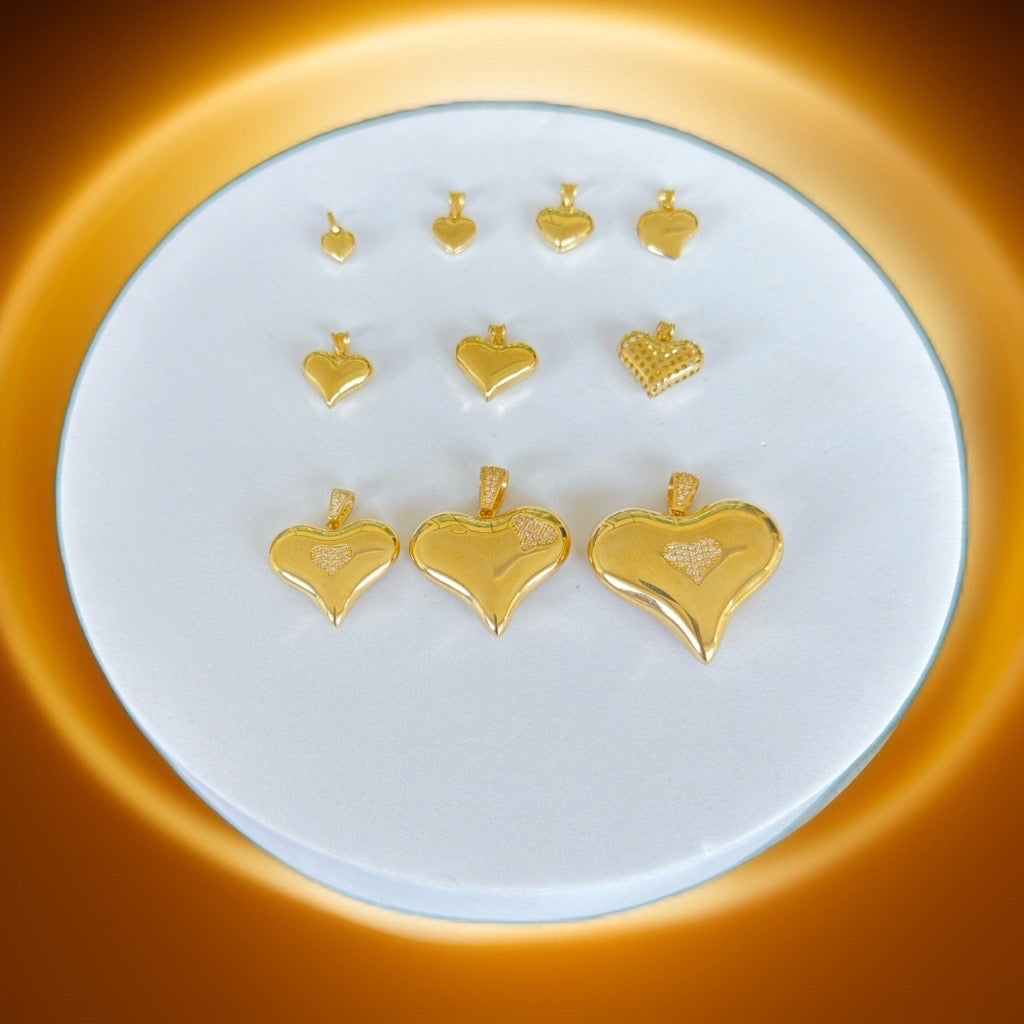 Dijes de corazón oro