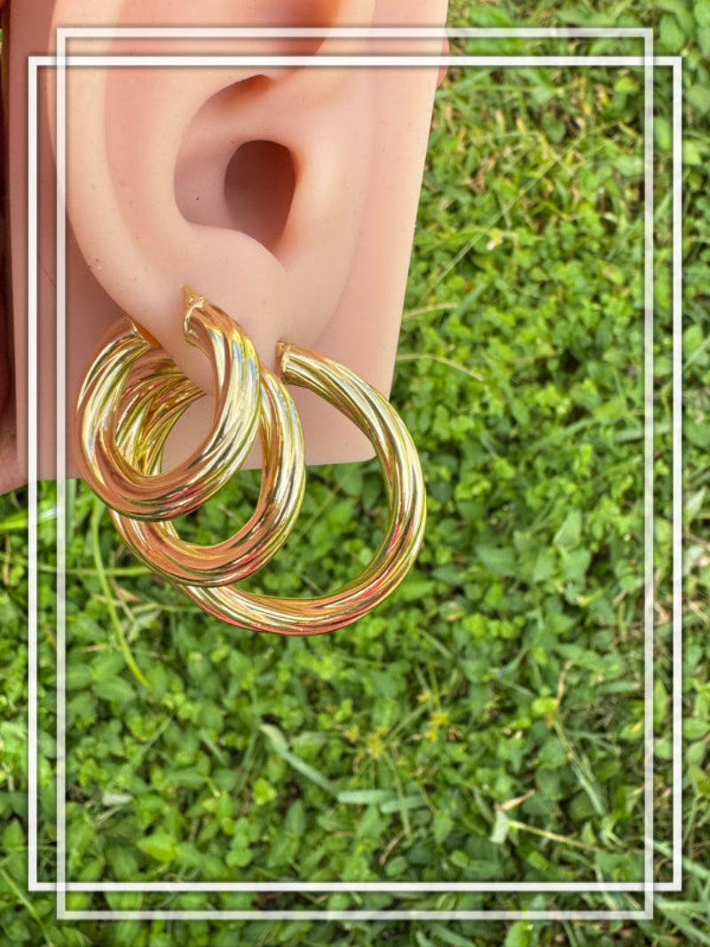 Argollas torcidas lisas, grosor 5 mm. -  