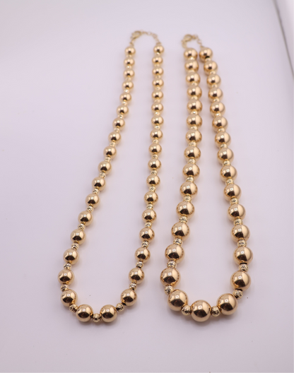 Mirror polished ball necklace.