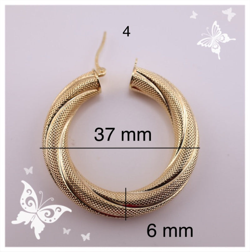 Argollas torcidas satinadas, 6 mm.