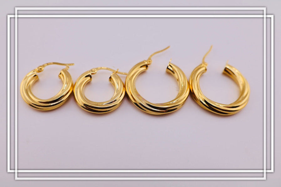 Argollas torcidas lisas, grosor 4 mm.