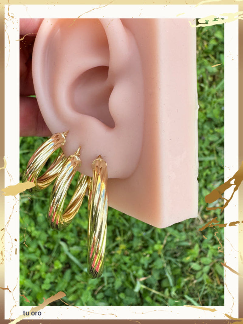 Argollas torcidas lisas, grosor 5 mm. -  