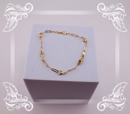 Pulseras de llaves y corazones