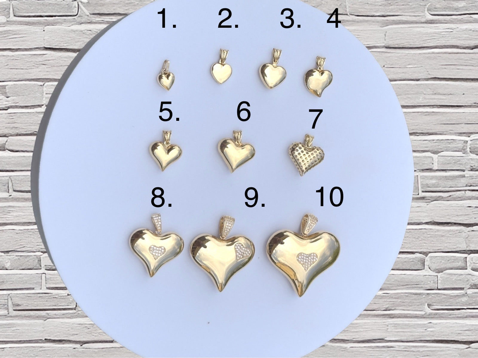 Dijes de corazón oro