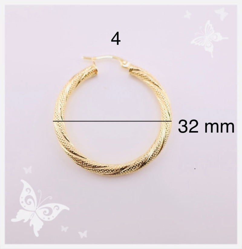Argollas torcidas, satinadas, grosor 3 mm.