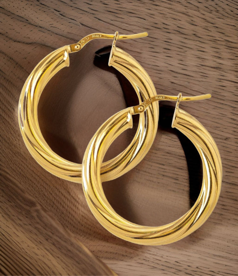 Argollas torcidas lisas, grosor 5 mm. -  