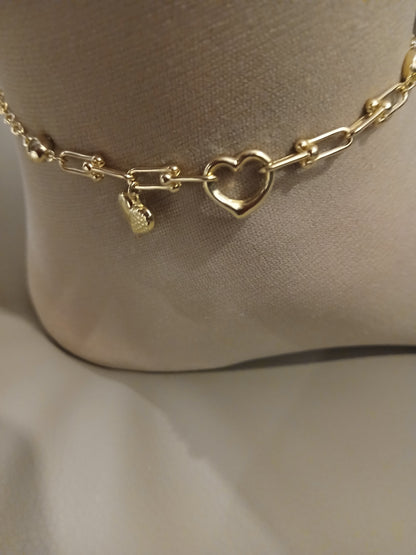 Gold anklet.