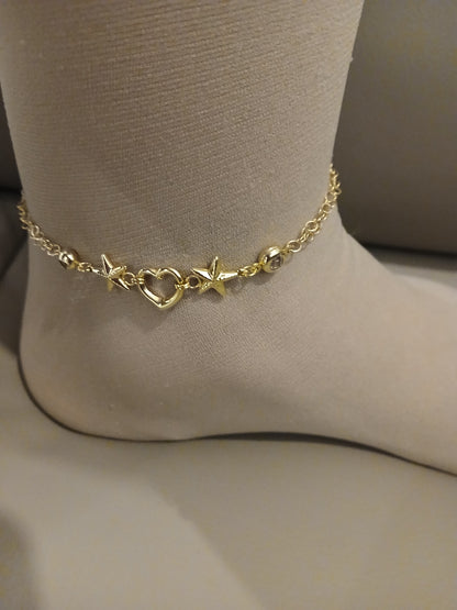 Gold anklet.