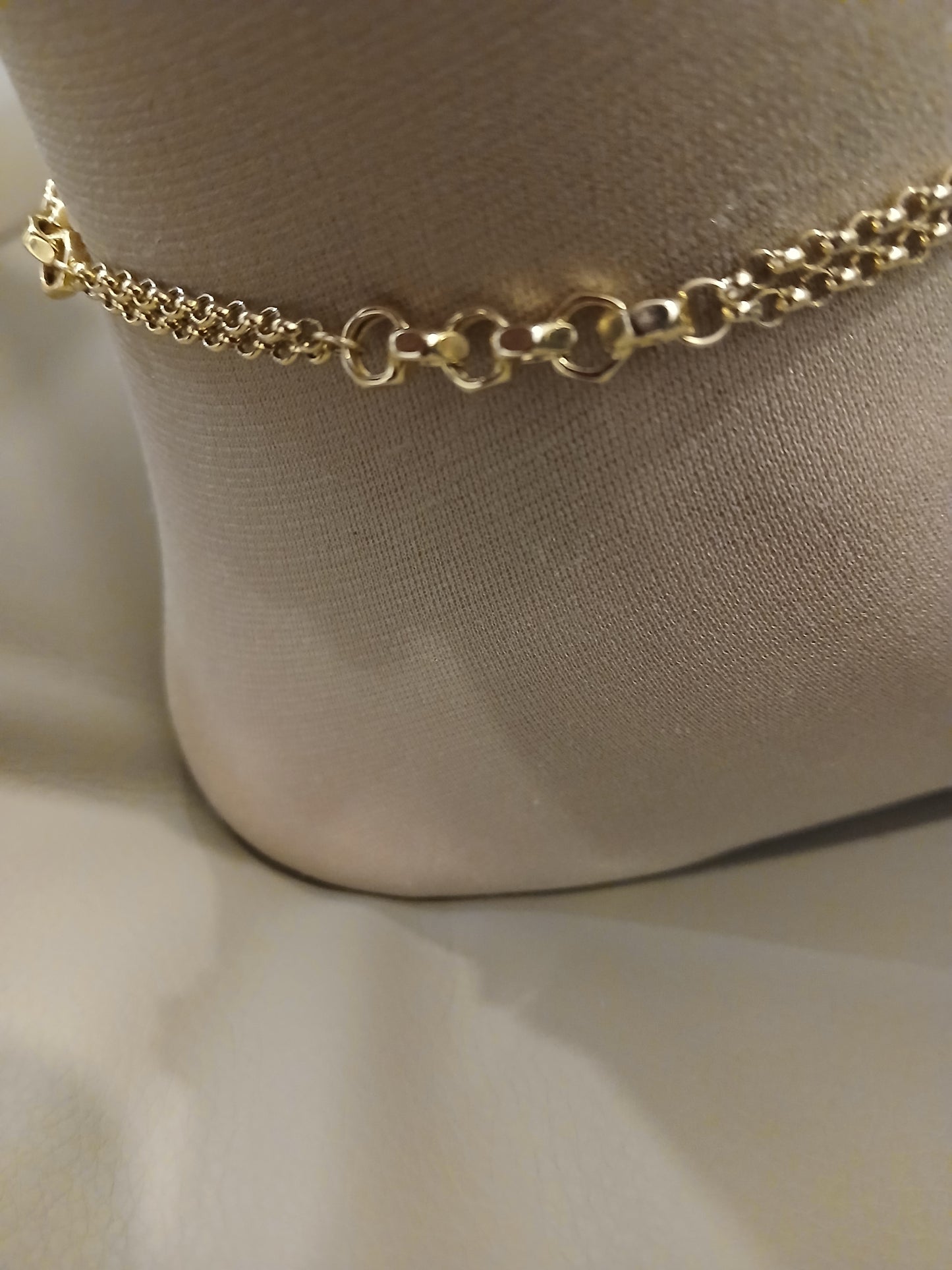 Gold anklet.