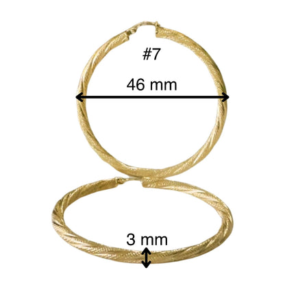 Argollas torcidas, satinadas, grosor 3 mm.  